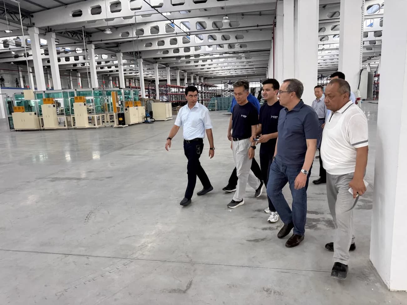 The delegation toured the new production facility